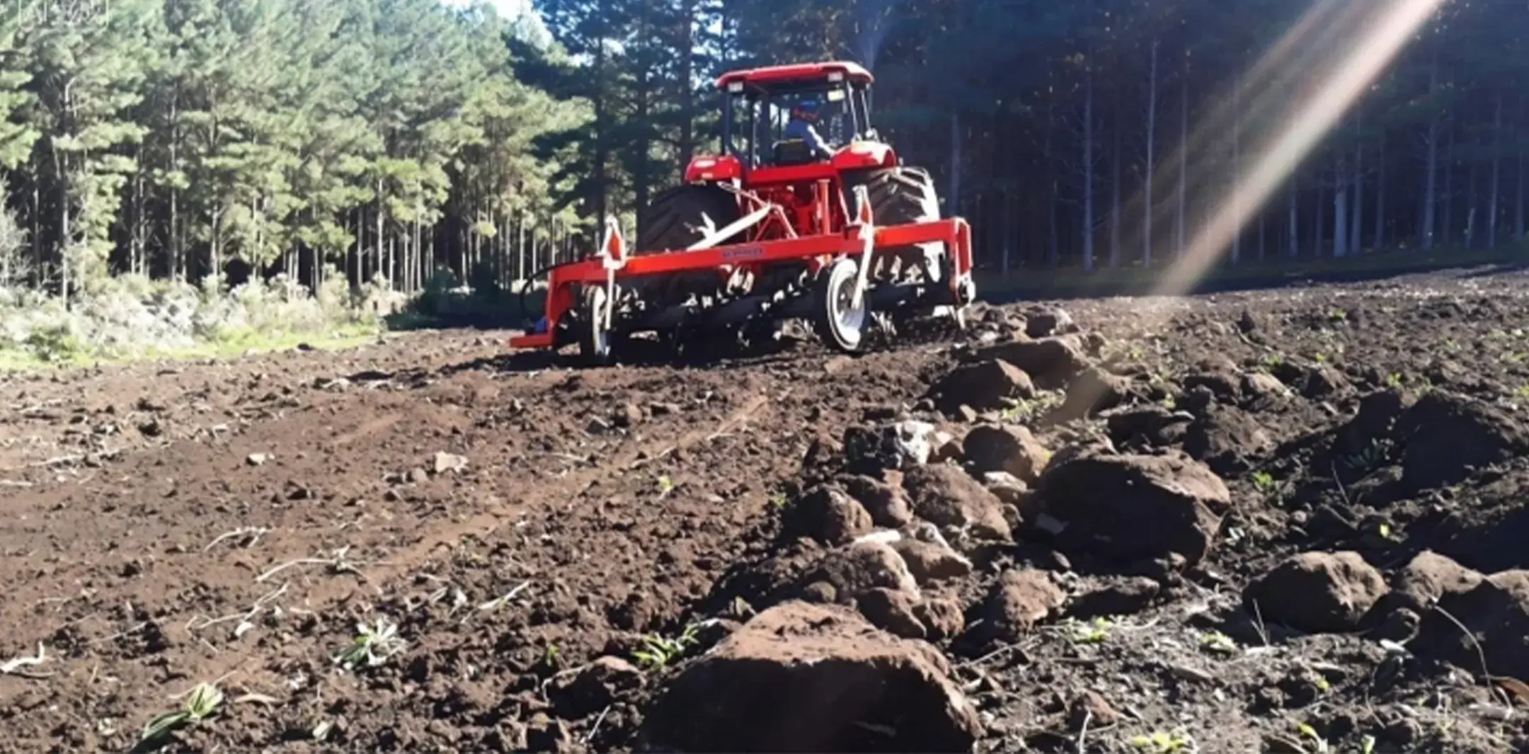 PTO stone crusher banner showing field application